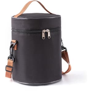 A cylindrical black lunch bag with a zipper closure and a detachable shoulder strap. It has a handle and branding.