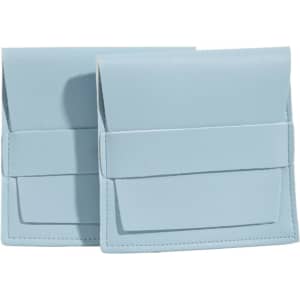 A light blue PU leather flip jewelry pouch, featuring a fold-over design and a front pocket. Two pouches are displayed.