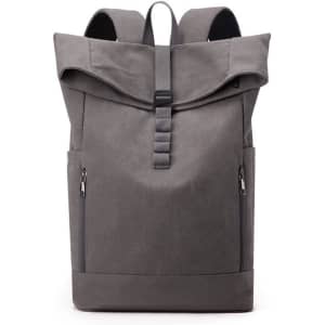 A grey canvas roll top vintage backpack with two side zippers and a logo on the front.