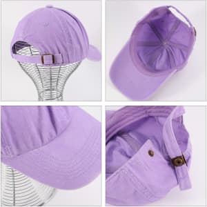 A premium washed cotton baseball cap in light purple, featuring a logo and an adjustable strap at the back.