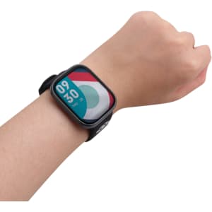 A black square smartwatch on a wrist, featuring a vibrant, multicoloured display of the time and date.
