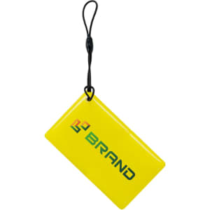 A yellow NFC epoxy square tag with a black strap and a logo.