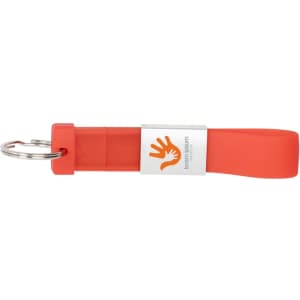 A bright orange silicone tag flash drive with a metal keyring attachment and a logo.