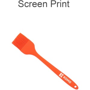 An orange pastry brush with a silicone bristle head and a long handle, featuring a logo.