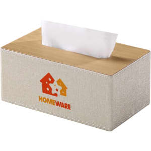 A medium tissue box with a textured beige fabric cover and a wooden top, featuring a logo on the front.