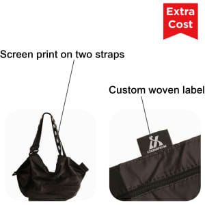 A foldable shopping shoulder bag in black, featuring screen print on two straps and a custom woven label.
