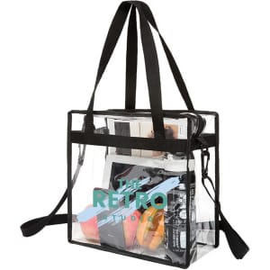 A transparent tote bag with a black shoulder strap, featuring various items inside and a logo on the front.