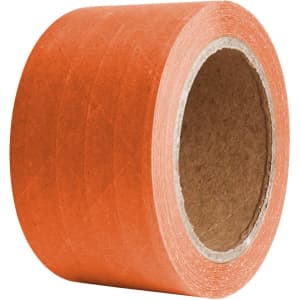 A roll of self-adhesive reinforced kraft paper tape in orange, featuring a cardboard core.