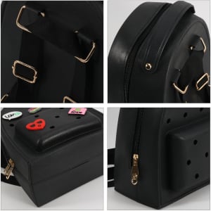 A black EVA Holes Backpack with adjustable straps, zippers, and a textured surface featuring decorative elements.