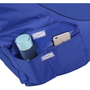 A blue outdoor chair with two side pockets containing a drink bottle and a smartphone. It features a logo.