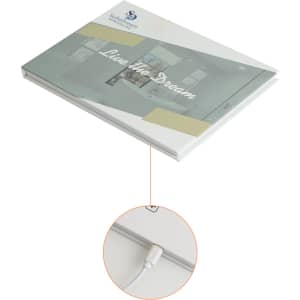 A 7-inch LCD video brochure with a white cable, featuring a sleek design and subtle colours. It includes a logo.