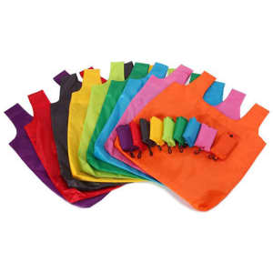 A variety of compact foldable shopping tote bags in multiple vibrant colours, arranged neatly, with matching pouches.