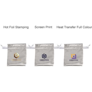 Three silk satin drawstring bags in silver, featuring different logo designs. Each bag has a white drawstring.