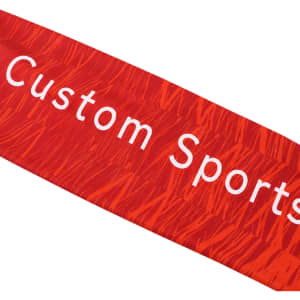 A red sports headband featuring a wavy pattern and prominent text. It has a logo or branding displayed on it.