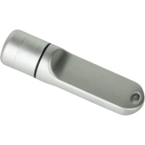 A silver flash drive with a sleek design and a branding logo on the side.