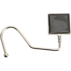 A silver desk hook with a square black top and a curved hook design. It features a round ball at the end.