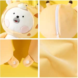A plush, yellow giraffe-shaped travel pillow featuring a zip closure and button fastenings, with a soft texture.
