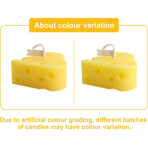 A pair of yellow cheese-shaped candles with a small label flag on each. One candle displays holes typical of cheese.