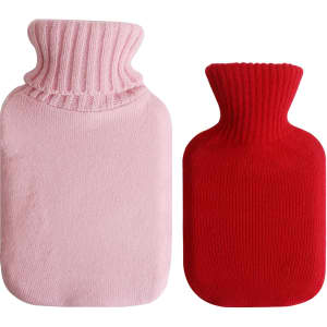 A hot water bottle with a knitted cover, featuring a pink and a red version, both with ribbed necks.