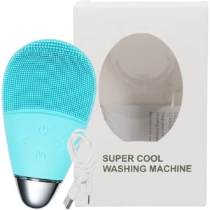 A silicone facial cleansing brush in teal, accompanied by a USB charging cable and packaging with a window.