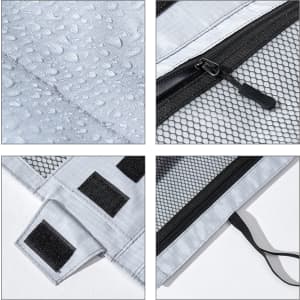 A multifunctional toiletry travel bag in grey, featuring a waterproof texture and mesh compartments with zippers.