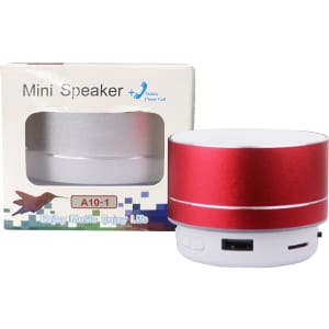 A red and white metal Bluetooth speaker next to its packaging, featuring a branding logo.