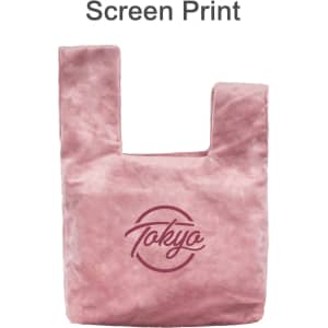 A pink velvet wrist bag featuring a logo on the front with a soft texture and a unique handle design.