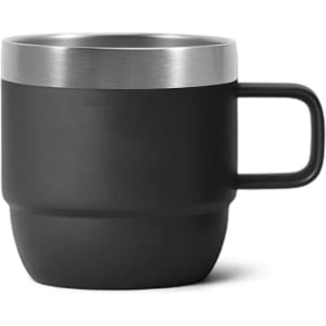 A stackable stainless steel mug in matte black featuring a silver rim and a sturdy handle.