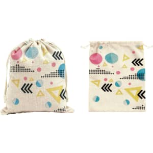 Cotton linen drawstring bags featuring a colourful geometric pattern in pink, blue, and black on a natural background.