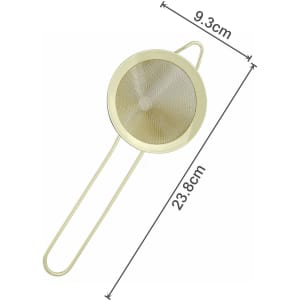 A gold bar mesh strainer with a circular mesh and two handles, measuring 9.3 cm by 23.8 cm.