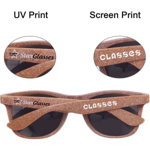 A pair of brown sunglasses made from coffee fibre, featuring dark lenses and branding on the arms.