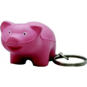 A pink mini pig stress item attached to a keyring, featuring a smiling expression and a metal keyring.