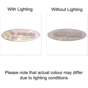 A hair clip featuring an iridescent alligator design, showing different appearances under varying lighting conditions.