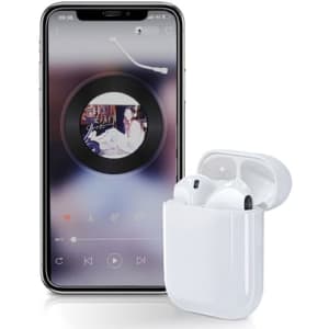 A pair of white wireless earbuds in a charging case next to a smartphone displaying a music app.