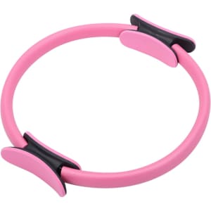 A pink Pilates circle with two black rubber grips. The product is lightweight and designed for fitness activities.
