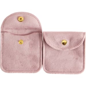 A square velvet jewellery pouch in soft pink, featuring two compartments and a gold snap closure.