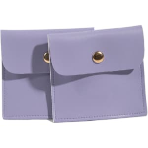 Two square PU leather jewelry pouches in light purple, featuring a snap button closure and a simple design.