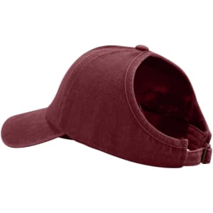 A maroon ponytail top hat with an open back design for hairstyle convenience. It features a logo on the side.
