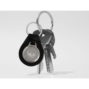 A metal keyring with a black PU leather holder, featuring multiple keys attached. The keyring has a logo.