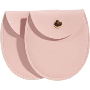 A pink oval PU leather jewelry pouch with a snap closure, featuring a smooth texture and a simple design.