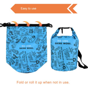 A blue dry bag with a foldable design and graphic patterns, featuring an adjustable strap and a logo.
