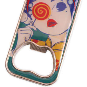 A drink bottle opener fridge magnet with a colourful design featuring a woman with a lollipop, finished in silver.