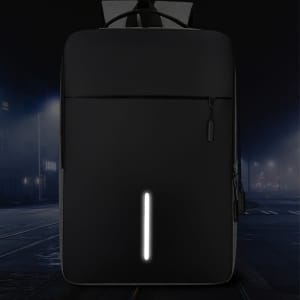 A black laptop backpack with a reflective strip and a logo, featuring a sleek, modern design.
