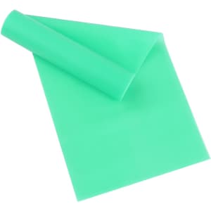 A green latex-free TPE fitness resistance band, rolled partially out, designed for leisure and sports activities.