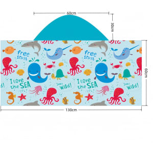A kids hooded towel surf shawl in blue featuring playful marine animal designs, including whales, octopuses, and starfish.