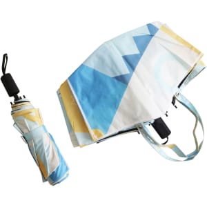 A folding umbrella with a geometric design in blue and yellow, accompanied by a matching carry case.