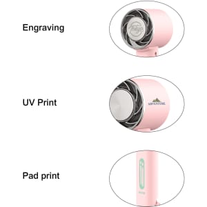 A pink personal cooling fan with engravings and printed designs. It features a compact and stylish design.