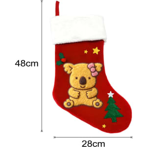 A red Christmas stocking featuring a koala design, fluffy white cuff, and decorated with stars and a green tree.