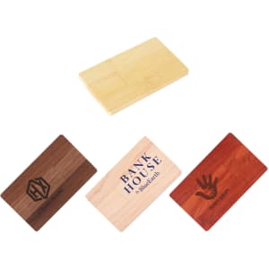 A collection of four wooden credit card flash drives in different shades, displaying various logos and designs.