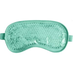 A gel eye mask in mint green featuring a bubble texture, designed for cold or hot therapy. Includes straps.
